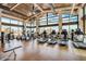 Well-equipped fitness center with modern exercise machines and floor to ceiling windows offering natural light at 18919 E Reata Ln, Rio Verde, AZ 85263