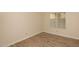 Bedroom with a light-colored wood-style flooring and natural light at 1915 E Citation Ln, Tempe, AZ 85284