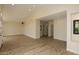 Open-concept living room featuring a neutral color palette, hardwood floors, and recessed lighting at 1915 E Citation Ln, Tempe, AZ 85284