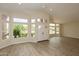 Bright and spacious living room with hardwood floors, recessed lighting, and large windows at 1915 E Citation Ln, Tempe, AZ 85284