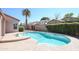 Beautiful backyard oasis featuring a sparkling pool with manicured landscaping and a tranquil atmosphere at 1915 E Citation Ln, Tempe, AZ 85284