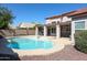 Inviting backyard pool with a covered patio, perfect for outdoor entertaining and relaxation on sunny days at 1915 E Citation Ln, Tempe, AZ 85284