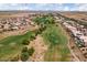 Aerial view showcases the golf course community, with mature landscaping and community pool at 19185 N 116Th Ln, Surprise, AZ 85378
