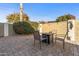 Private brick backyard patio with seating area and landscaping at 19185 N 116Th Ln, Surprise, AZ 85378