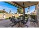 Inviting covered patio featuring a dining area, creating the perfect outdoor living space at 19185 N 116Th Ln, Surprise, AZ 85378