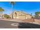 Charming single-story home with arched entryway, desert landscaping, and attached two car garage at 19185 N 116Th Ln, Surprise, AZ 85378