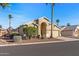 Charming single-story home with arched entryway, desert landscaping, and attached two car garage at 19185 N 116Th Ln, Surprise, AZ 85378