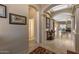Spacious foyer with tile flooring, arched doorways, and view into the formal living area at 19185 N 116Th Ln, Surprise, AZ 85378