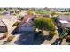 Enjoy the beautiful aerial view of this desert landscaped property and its mature shade tree at 20113 N Lagos Ct, Surprise, AZ 85374