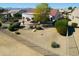 A charming covered patio provides ample shade in this backyard featuring desert landscaping at 20113 N Lagos Ct, Surprise, AZ 85374