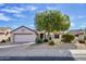 Charming home with mature landscaping and a spacious two car garage at 20113 N Lagos Ct, Surprise, AZ 85374