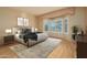 Cozy bedroom with a large window that offers plenty of natural light at 20113 N Lagos Ct, Surprise, AZ 85374