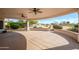 Covered patio with decorative wall overlooking the desert landscaping at 20113 N Lagos Ct, Surprise, AZ 85374