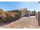 Private backyard featuring low-maintenance desert landscaping, with potential for customization at 20386 E Bronco Dr, Queen Creek, AZ 85142