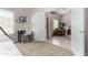 This bedroom features a desk with chair and access to another room at 20386 E Bronco Dr, Queen Creek, AZ 85142