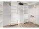 An organized walk-in closet with a variety of shelves and storage spaces at 20386 E Bronco Dr, Queen Creek, AZ 85142
