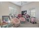 Bright and airy bedroom with light-colored walls, a ceiling fan, and lots of natural light at 20421 W Legend Trl, Buckeye, AZ 85396
