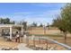 Community dog park with shade structure and separate play areas at 2263 N Trekell Rd # 175, Casa Grande, AZ 85122