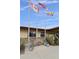 Welcome to Rancho Val Vista with flags and community welcome sign at 2263 N Trekell Rd # 175, Casa Grande, AZ 85122