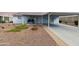 Charming single-story home featuring a covered entry, low maintenance landscaping, and relaxing outdoor seating at 2263 N Trekell Rd # 175, Casa Grande, AZ 85122