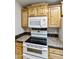 The kitchen showcases stainless steel appliances, complemented by wood cabinets and granite countertops at 2263 N Trekell Rd # 175, Casa Grande, AZ 85122