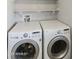 Well-lit laundry room featuring a modern washer and dryer set for convenient laundry care at 2263 N Trekell Rd # 175, Casa Grande, AZ 85122