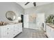 Open-concept Bedroom featuring a crib, dresser, and a connection to the en suite bathroom at 2402 E 5Th St # 1455, Tempe, AZ 85288