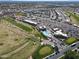 Community aerial view features a pool, golf course, and easy access to nearby shopping at 2416 N Snead Dr, Mesa, AZ 85215