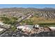 Breathtaking aerial shot showcases the clubhouse, pool, and well-manicured golf course in the community at 2416 N Snead Dr, Mesa, AZ 85215