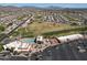 Expansive aerial view of community amenities including a golf course and pool at 2416 N Snead Dr, Mesa, AZ 85215