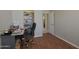 This bedroom features a walk-in closet and a door leading to the bathroom at 2416 N Snead Dr, Mesa, AZ 85215