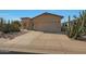 Desirable property featuring well maintained landscaping and a two-car garage, plus covered front patio seating at 2416 N Snead Dr, Mesa, AZ 85215