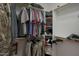Spacious walk-in closet with ample hanging space and organized shelving for storage at 2416 N Snead Dr, Mesa, AZ 85215