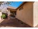 Exterior view of the home with a covered patio, manicured landscaping, and a stucco facade at 2454 E Vermont Dr, Gilbert, AZ 85295