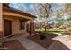 Inviting front porch with stone accents and meticulous landscaping at 2454 E Vermont Dr, Gilbert, AZ 85295