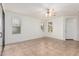 Spacious room with neutral tones, tiled flooring, and natural light at 2454 E Vermont Dr, Gilbert, AZ 85295