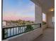 Relaxing balcony showcasing tranquil community views and painted railings at 2511 W Queen Creek Rd # 307, Chandler, AZ 85248