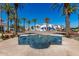 Stunning community, with well-maintained landscaping, palm trees, and decorative fountain, creating a welcoming environment at 2511 W Queen Creek Rd # 307, Chandler, AZ 85248