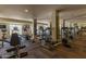 Bright and spacious gym featuring state-of-the-art exercise equipment and mirrored walls at 2511 W Queen Creek Rd # 307, Chandler, AZ 85248