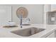 The kitchen sink features modern faucet and quartz countertop at 2511 W Queen Creek Rd # 307, Chandler, AZ 85248