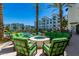 Cozy outdoor seating area with a fire pit and luxurious residential buildings as backdrop at 2511 W Queen Creek Rd # 307, Chandler, AZ 85248