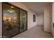 Spacious patio with sliding glass doors leading to a cozy interior living space at 2511 W Queen Creek Rd # 307, Chandler, AZ 85248