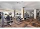 Well-equipped fitness center featuring modern equipment, treadmills, and weight machines for residents to enjoy at 2511 W Queen Creek Rd # 323, Chandler, AZ 85248
