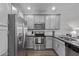 Modern kitchen featuring stainless steel appliances, sleek countertops, and ample storage space at 2511 W Queen Creek Rd # 323, Chandler, AZ 85248