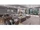 Well-decorated lounge with comfortable seating, including couches and chairs at 2511 W Queen Creek Rd # 323, Chandler, AZ 85248