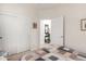 Bedroom with closet and neutral carpet; showcases a glimpse into the adjoining room at 26057 W Sequoia Dr, Buckeye, AZ 85396