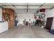 Spacious garage with ample storage, featuring built-in cabinets and organized shelving at 26057 W Sequoia Dr, Buckeye, AZ 85396