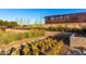 Community entrance sign with manicured landscaping and architectural plantings at 26199 S 227Th St, Queen Creek, AZ 85142