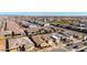 Aerial view of a new construction neighborhood featuring single-Gathering homes with tile roofs at 26199 S 227Th St, Queen Creek, AZ 85142