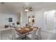 Bright dining area boasts wood table, seating for six, and access to the outdoor space at 2907 S Elm St, Tempe, AZ 85282